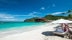 A stunning white sand beach in St. Barths, perfect for swimming, snorkelling, and on your yacht charter