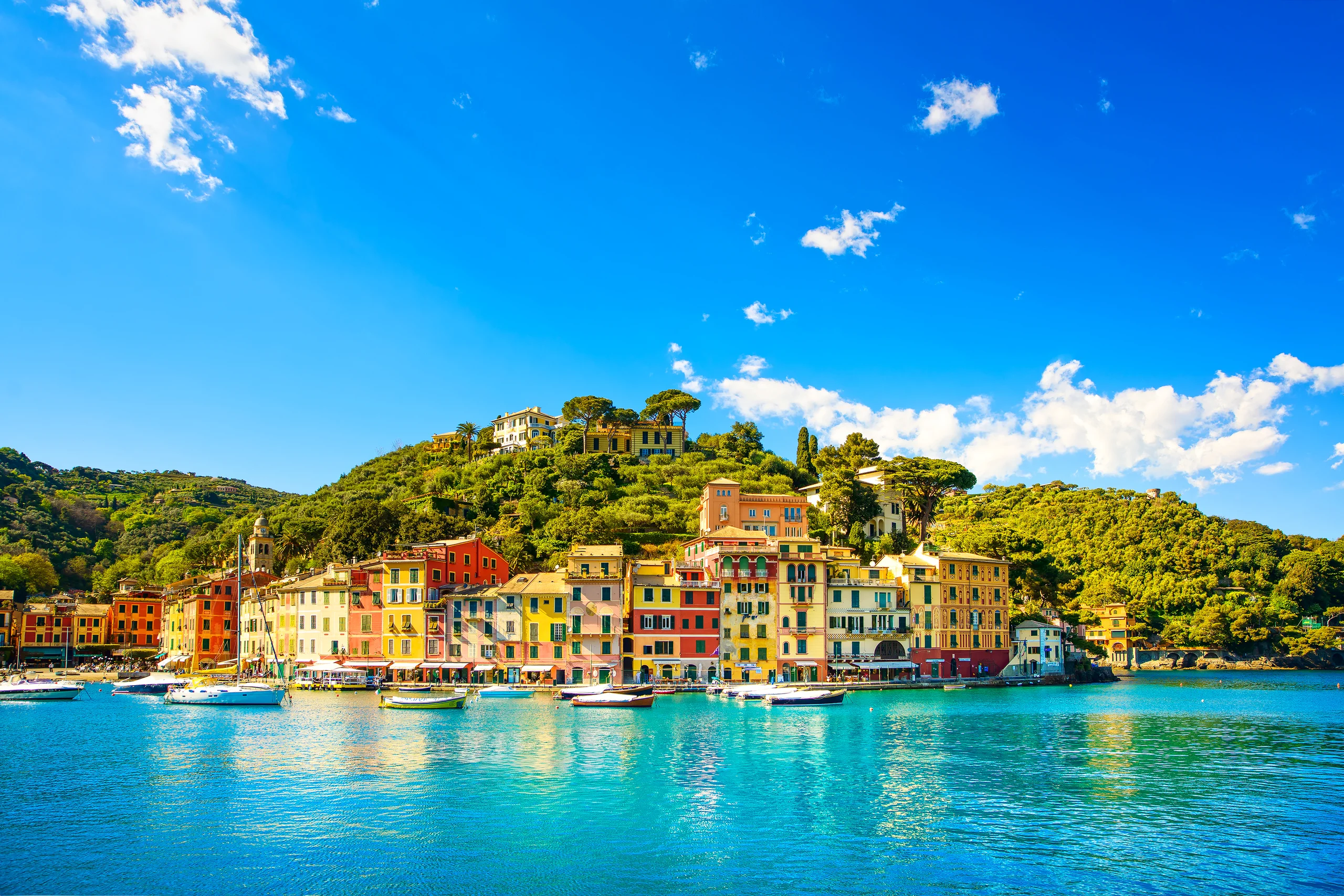 Luxury yacht docked in Antibes Marina, showcasing the charming coastal town, historic fortifications, and sparkling Mediterranean waters
