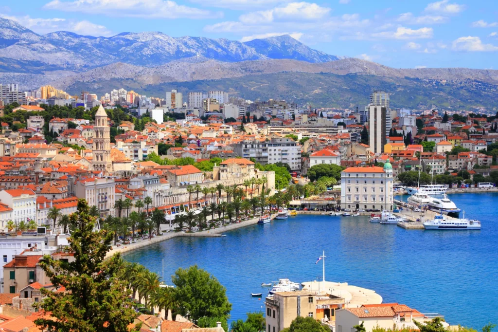 Luxury yacht cruising near Split, Croatia, with crystal-clear Adriatic waters, historic architecture, and scenic coastal views.