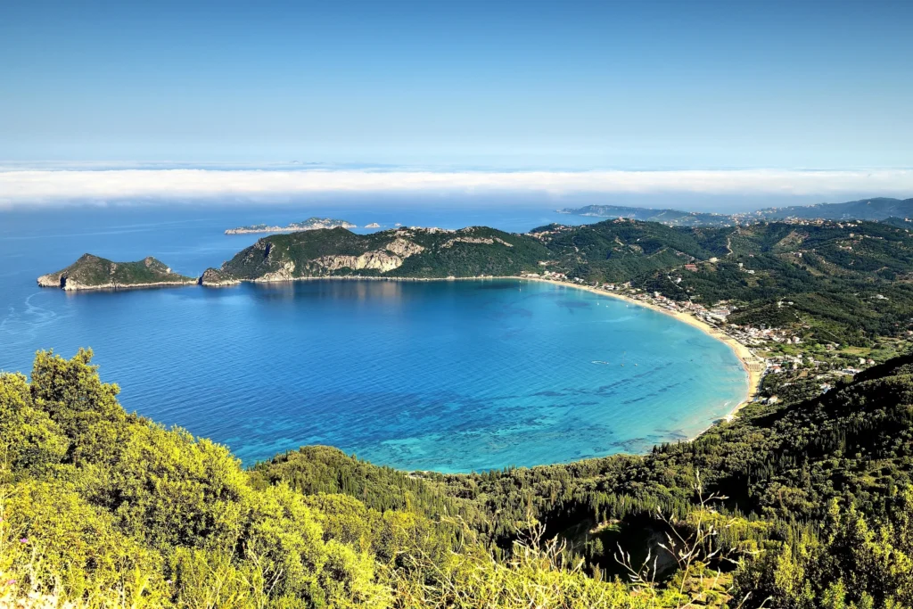 Luxury yacht cruising near Budva, Montenegro, with sparkling Adriatic waters, historic coastal charm, and vibrant marinas.